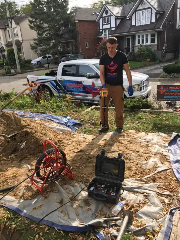 Tornado Plumbing & Drains sewer camera reel and monitor on a Toronto property — pre-purchase sewer scope inspection.